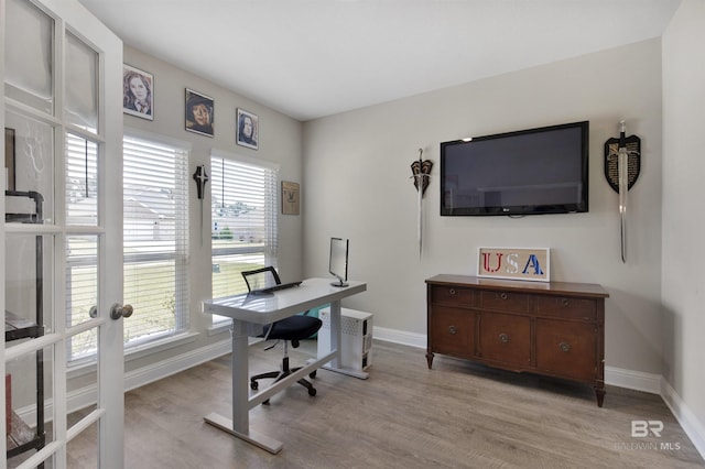 2345 Laurel St, Semmes, AL 36575 - office with light wood-style flooring and french doors