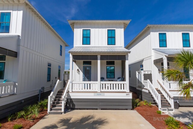 view of front of home featuring covered porch