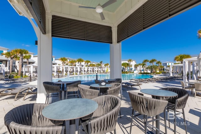 2471 Saltgrass Way, Orange Beach, AL 36561 - view of patio with ceiling fan and a community pool