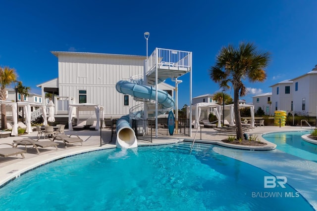2471 Saltgrass Way, Orange Beach, AL 36561 - view of pool with a patio and a water slide