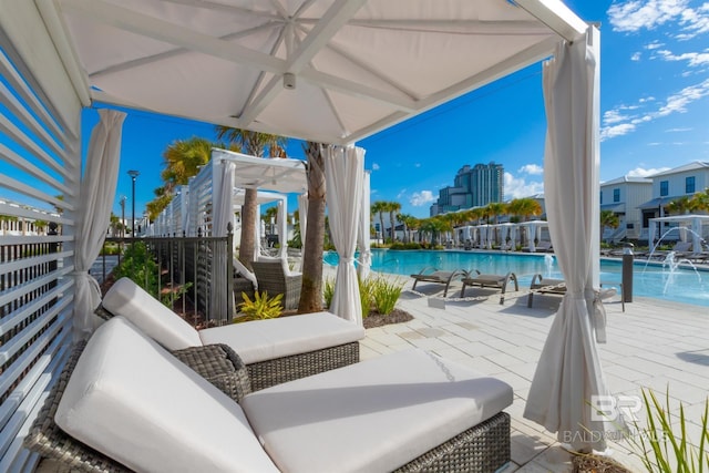 2471 Saltgrass Way, Orange Beach, AL 36561 - view of patio with pool water feature and a community pool