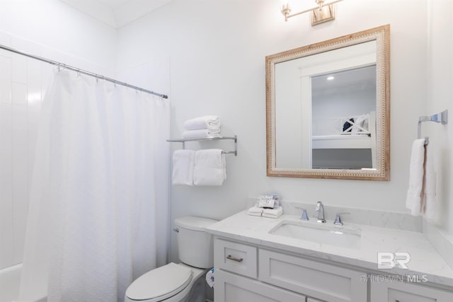 2471 Saltgrass Way, Orange Beach, AL 36561 - bathroom featuring vanity, toilet, and curtained shower