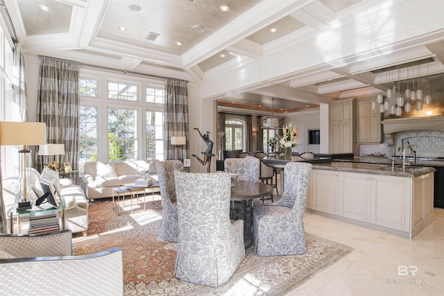 dining space with beamed ceiling, crown molding, coffered ceiling, and a high ceiling