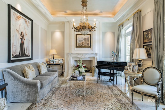 living area featuring a notable chandelier, crown molding, and a tray ceiling