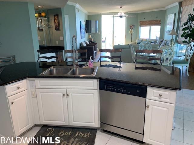 kitchen featuring sink, ceiling fan, dishwasher, and white cabinetry