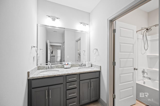 bathroom featuring vanity and bathtub / shower combination