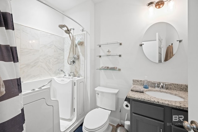 full bathroom featuring vanity, toilet, and shower / bath combo