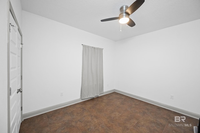 unfurnished bedroom featuring ceiling fan