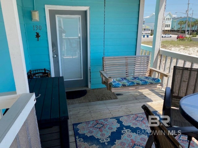 property entrance with a porch