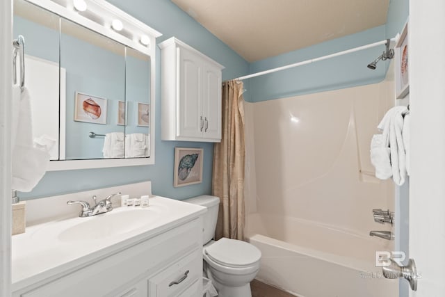 full bathroom with shower / bath combination with curtain, vanity, and toilet