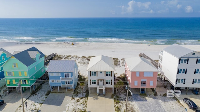 aerial view featuring a water view and a view of the beach