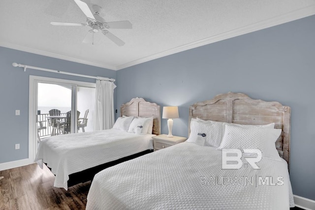 22984 Perdido Beach Blvd Unit 52D, Orange Beach, AL 36561 - bedroom featuring crown molding, baseboards, access to outside, and wood finished floors
