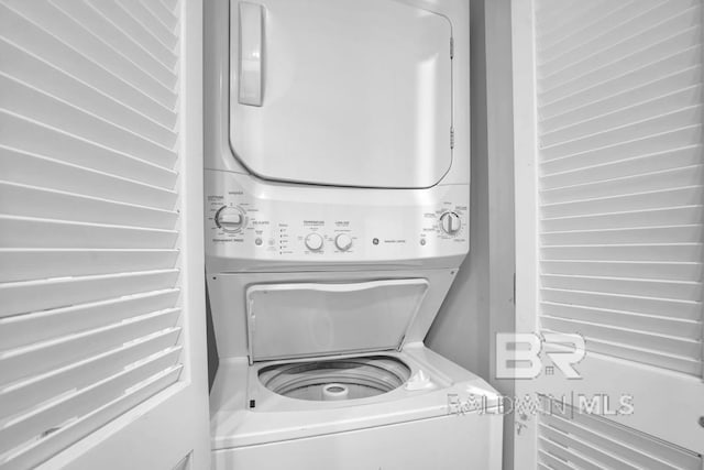 22984 Perdido Beach Blvd Unit 52D, Orange Beach, AL 36561 - laundry area with stacked washer / drying machine and laundry area