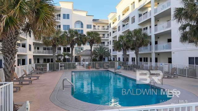 22984 Perdido Beach Blvd Unit 52D, Orange Beach, AL 36561 - community pool with fence and a patio area