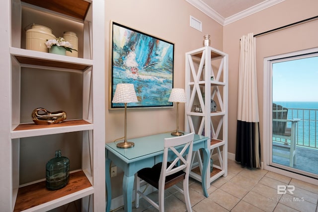 office area with tile patterned flooring, a water view, and crown molding