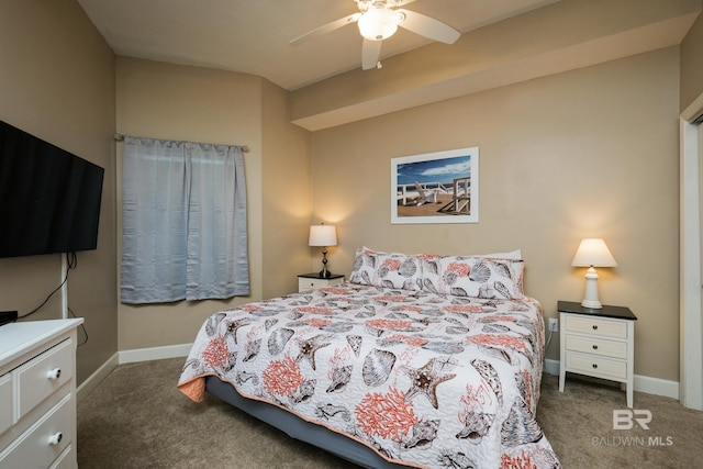 bedroom featuring ceiling fan and dark colored carpet