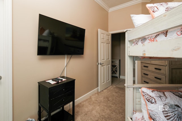 carpeted bedroom featuring ornamental molding