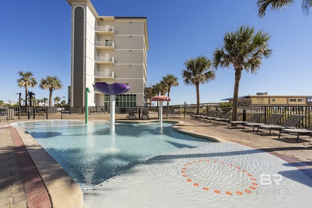 view of swimming pool featuring a patio