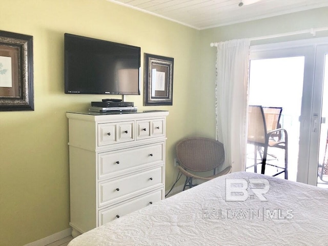 bedroom featuring baseboards