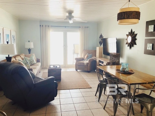 living room featuring wooden ceiling, ceiling fan, and light tile patterned flooring