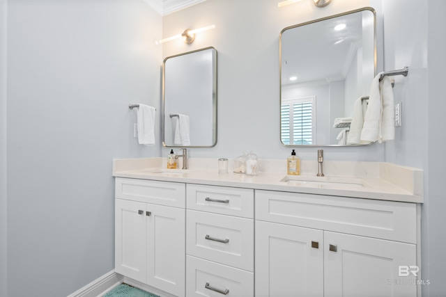 28250 Canal Rd Unit 101, Orange Beach, AL 36561 - bathroom with ornamental molding, a sink, and double vanity