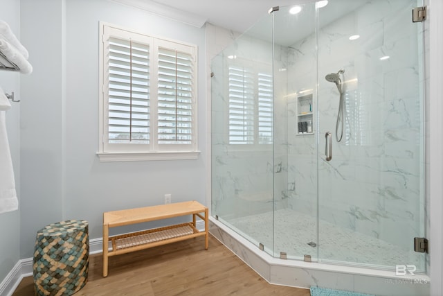 28250 Canal Rd Unit 101, Orange Beach, AL 36561 - bathroom with baseboards, a marble finish shower, and wood finished floors