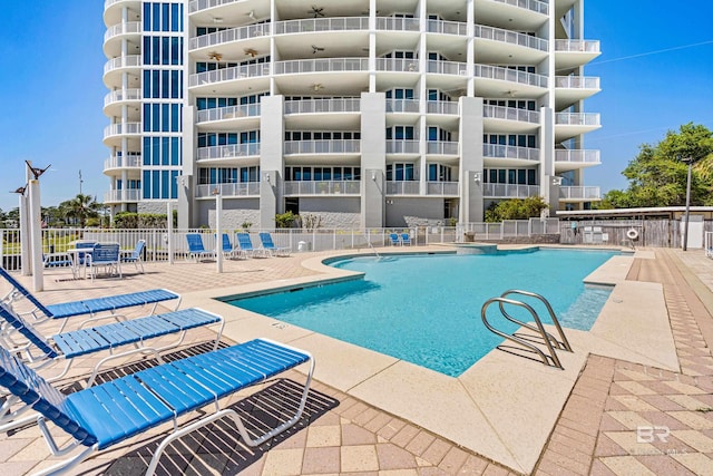 28250 Canal Rd Unit 101, Orange Beach, AL 36561 - community pool featuring fence and a patio