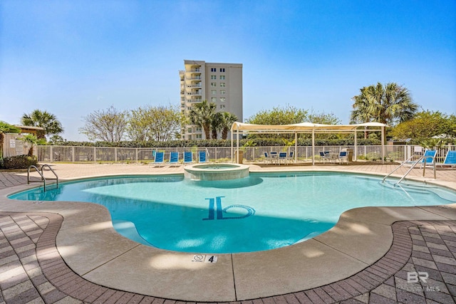 28250 Canal Rd Unit 101, Orange Beach, AL 36561 - view of pool with a pool with connected hot tub, fence, and a patio