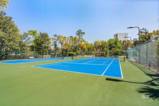 28250 Canal Rd Unit 101, Orange Beach, AL 36561 - view of sport court featuring fence