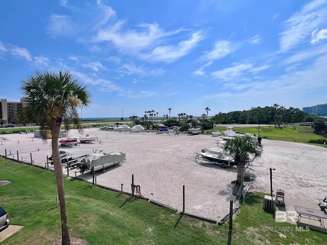 view of home's community with a lawn