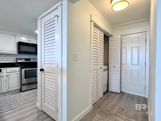 hall featuring light hardwood / wood-style flooring