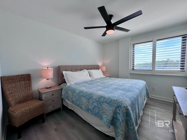 bedroom with hardwood / wood-style flooring and ceiling fan