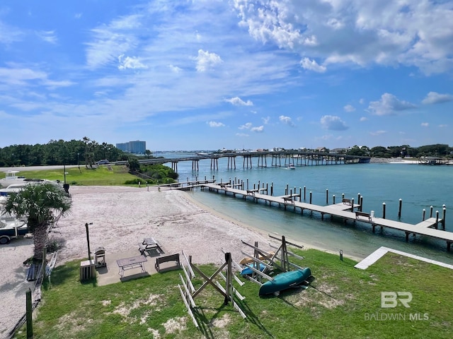 dock area featuring cooling unit and a water view