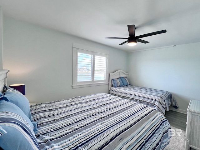 bedroom featuring ceiling fan and wood-type flooring