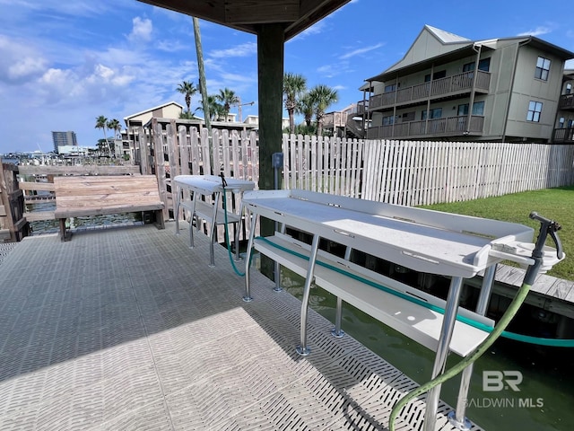 view of dock featuring a balcony