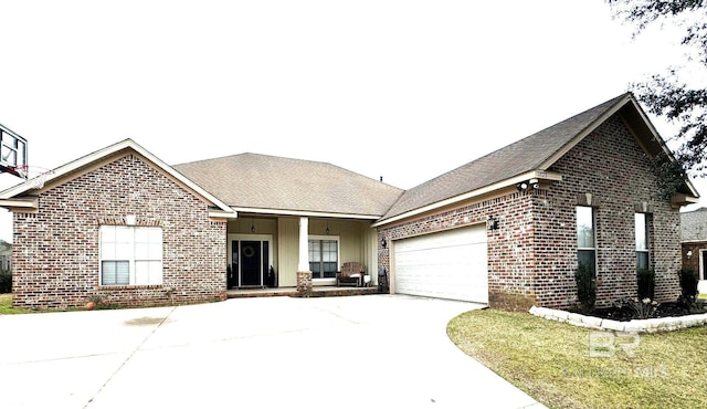 single story home featuring brick siding, concrete driveway, and an attached garage