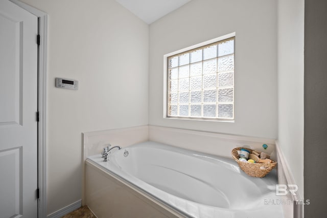 full bath with a garden tub