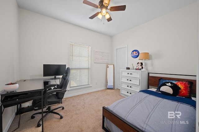 bedroom with baseboards, carpet floors, and ceiling fan