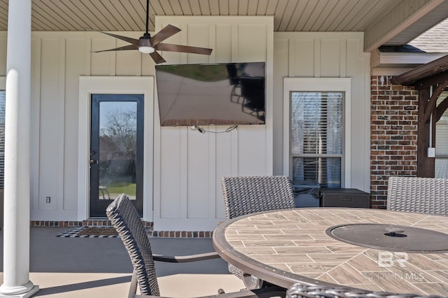 view of patio / terrace featuring outdoor dining space and ceiling fan