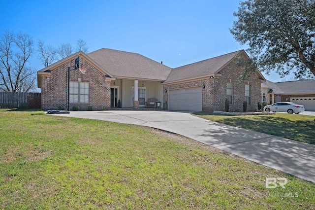 ranch-style house featuring a front lawn, fence, concrete driveway, a garage, and brick siding