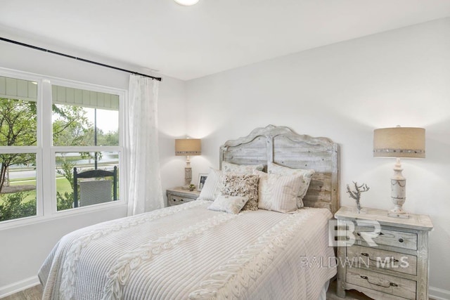 bedroom featuring hardwood / wood-style floors