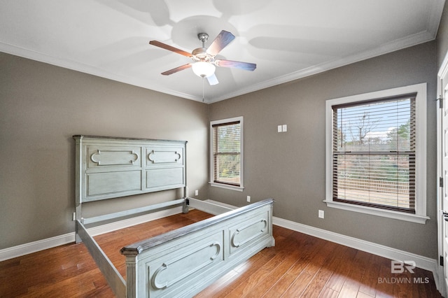 misc room featuring crown molding, ceiling fan, and light hardwood / wood-style flooring