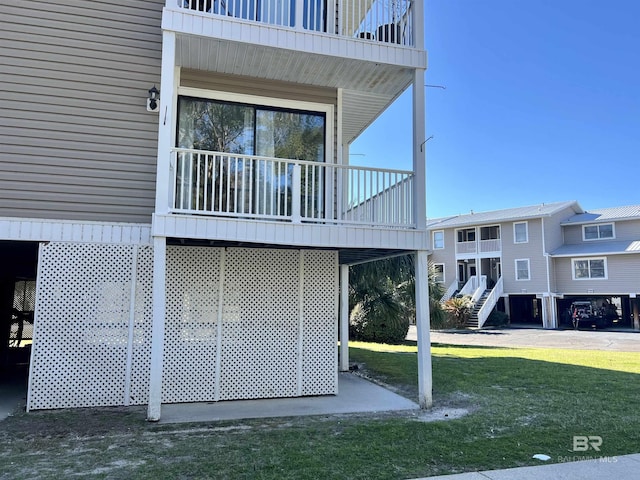 6 Yacht Club Dr Unit 115A, Daphne, AL 36526 - exterior space featuring a lawn