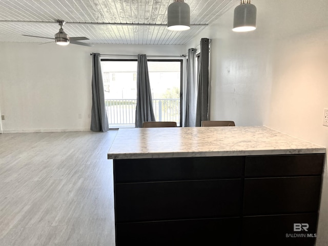 6 Yacht Club Dr Unit 115A, Daphne, AL 36526 - kitchen featuring light countertops, wood finished floors, dark cabinetry, and ceiling fan