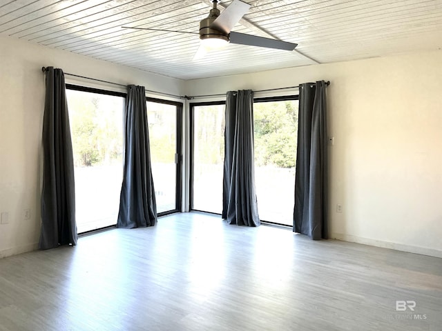 6 Yacht Club Dr Unit 115A, Daphne, AL 36526 - empty room with baseboards, a ceiling fan, and wood finished floors