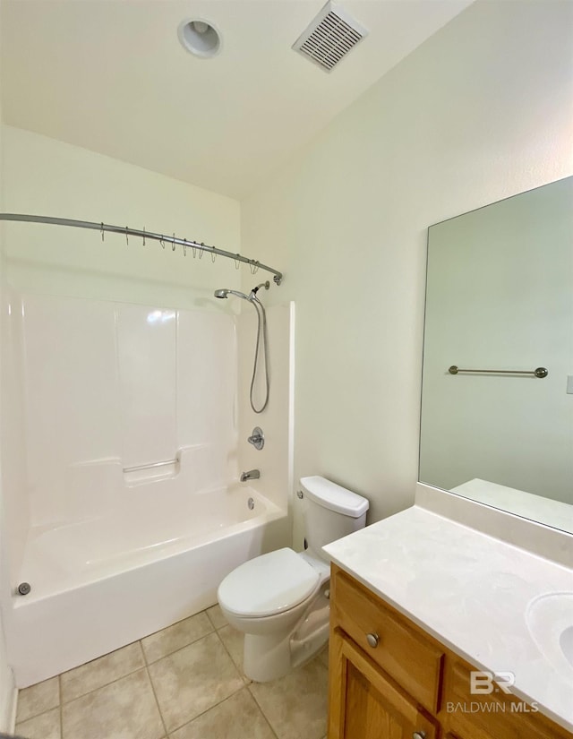 full bathroom with tile patterned flooring, vanity, bathing tub / shower combination, and toilet