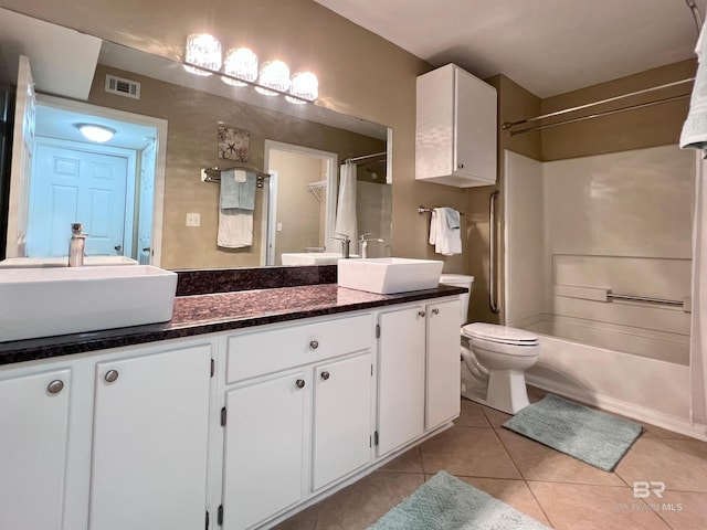6194 Gulf Shores Pkwy Unit A6, Gulf Shores, AL 36542 - full bath with double vanity, tile patterned flooring, toilet, and shower / washtub combination