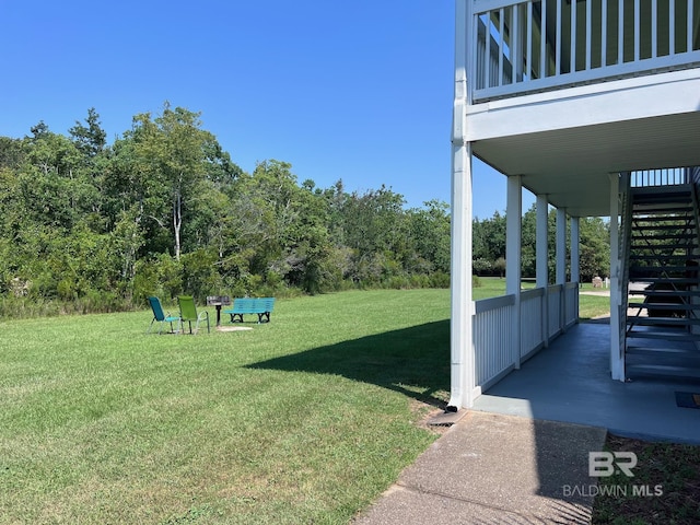 6194 Gulf Shores Pkwy Unit A6, Gulf Shores, AL 36542 - view of green lawn featuring stairway