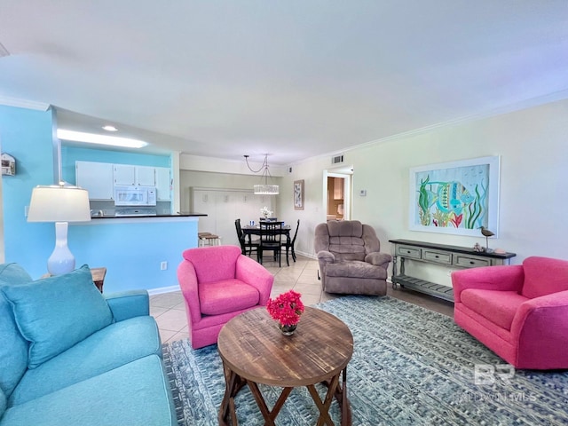 6194 Gulf Shores Pkwy Unit A6, Gulf Shores, AL 36542 - living area featuring light tile patterned floors, crown molding, and baseboards