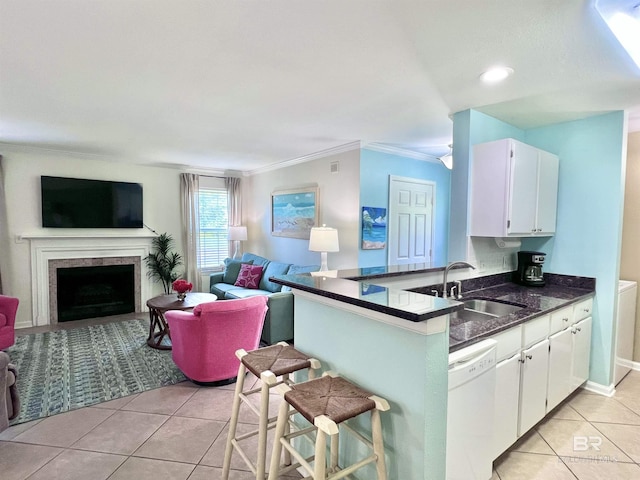 6194 Gulf Shores Pkwy Unit A6, Gulf Shores, AL 36542 - kitchen with dishwasher, open floor plan, a sink, light tile patterned floors, and white cabinetry